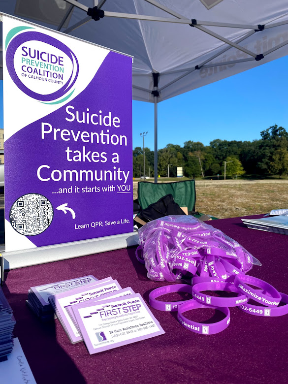 Suicide Prevention Booth with Banner and Bracelets